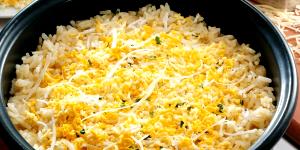 Quantas calorias em 1 Xícara, Cozido Arroz Amarelo?