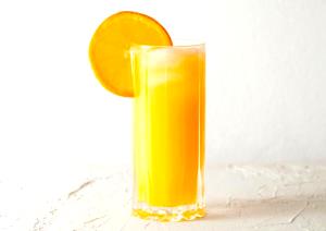 Quantas calorias em 1 Xícara Suco de Laranja Natural?