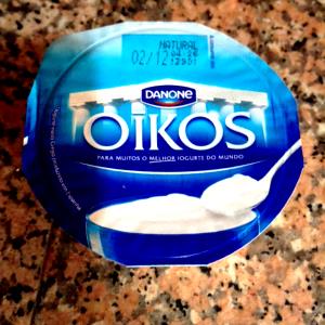 Quantas calorias em 1 Xícara (200,0 G) Iogurte grego natural, Danone?