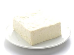 Quantas calorias em 1 Xícara (248,0 G) Tofu, cru?
