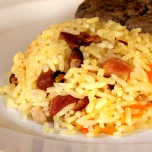 Quantas calorias em 100 G Arroz com Cenoura?