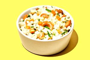 Quantas calorias em 100 g Arroz de Couve Flor com Cenoura e Castanhas?