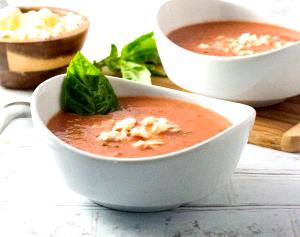 Quantas calorias em 100 G Bisque de Tomate?