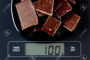Quantas calorias em 100 G Chocolate?
