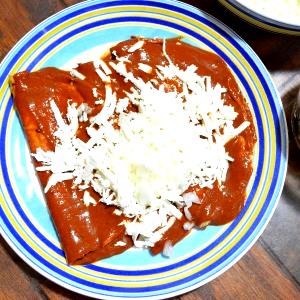 Quantas calorias em 100 G Enchilada sem Carne com Queijo?