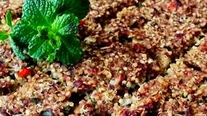 Quantas calorias em 100 g L7 Quibe de Quinoa Recheado com Carne?