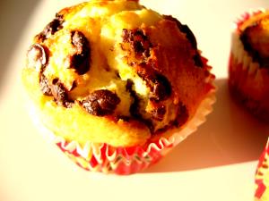 Quantas calorias em 100 G Muffin com Pepitas de Chocolate?