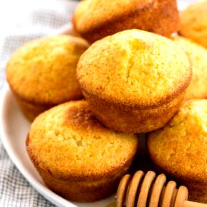 Quantas calorias em 100 G Muffins de Milho?