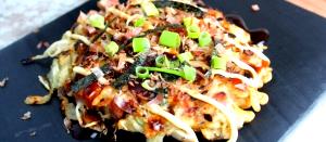 Quantas calorias em 100 G Okonomiyaki?