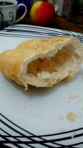 Quantas calorias em 100 G Pão Francês sem Miolo?
