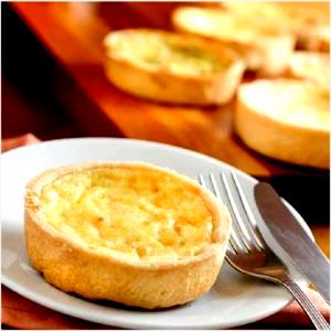 Quantas calorias em 100 g Quiche 4 Queijos?