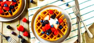 Quantas calorias em 100 G Waffle com Frutas?