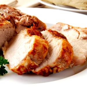 Quantas calorias em 100 Gramas Carne de porco, cozida?