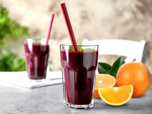 Quantas calorias em 100 ml Suco Açaí + Laranja?