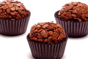 Quantas calorias em 2 colheres (20 g) Chocolate Tradicional?