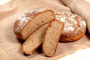 Quantas calorias em 4 fatias de 1cm (50 g) Pão de Centeio?